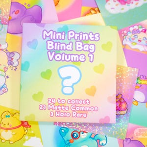 May include: A rainbow-coloured card with the text "Mini Prints Blind Bag Volume 1" and a question mark. The card has a background of hearts and a holographic finish. The text "24 to collect 21 Matte Common 3 Holo Rare" is also on the card.