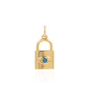 May include: Gold padlock charm with a blue evil eye design.