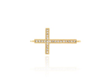 May include: A gold cross hair clip with clear rhinestones.
