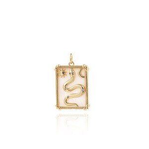 May include: Gold pendant necklace with a white mother of pearl rectangle featuring a snake design with a star and crescent moon.