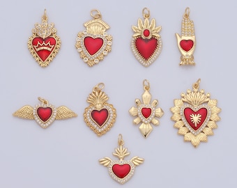 May include: Nine gold-tone pendants with red enamel hearts and crystal accents. The pendants feature various designs, including a crown, flames, wings, and a hand.