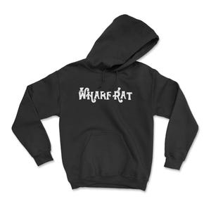 May include: Black hooded sweatshirt with the white text "WHARF RAT" across the chest. The sweatshirt has a front pocket and a drawstring hood. The garment is made of a soft material.