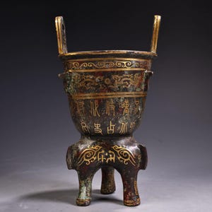 Pot tripode en bronze