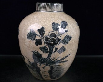 Blue and white split ceramic flower and bird pattern jar