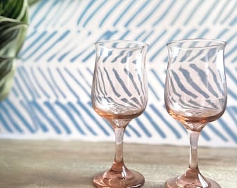 Pair of vintage Libbey pink tulip wine glasses