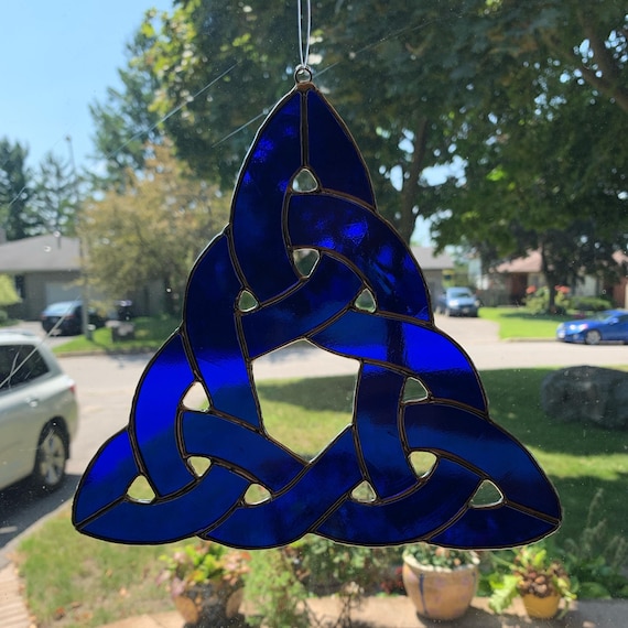 Celtic Knot Stained Glass Suncatcher, Triangle in Deep Blue. Shade may vary slightly.