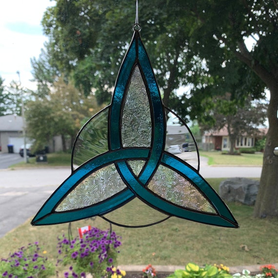 Stained Glass Celtic Triquetra with Halo in Lightly Textured Bright Turquoise, Textured Iridescent Clear, and Clear Waterglass