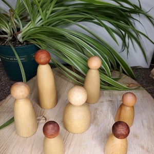 Set of 7 peg dolls for open ended play, diverse skin tones, curiosity approach loose parts