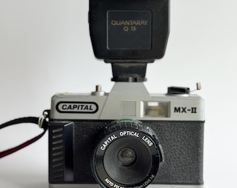 Vintage Capital MX-II camera, untested, 35mm film camera, 50mm optical lens, retro photography, industrial aesthetic, mx-2 auto fix