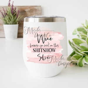 May include: White stainless steel wine tumbler with a pink watercolor background and the text "Murder Design Co. Wine because you can't run this SHITSOW Sober Murder Design Co."