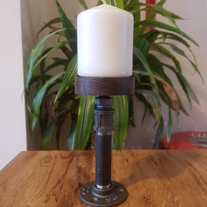 Industrial steel pipe candle holder with solid wood top