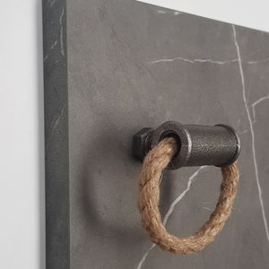 Industrial pull handle from malleable iron and linen rope