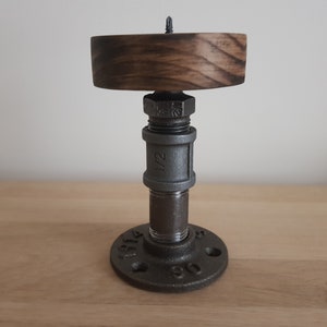 Industrial steel pipe candle holder with solid wood top