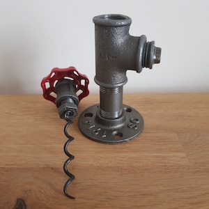 Iron Corkscrew with red valve handle top