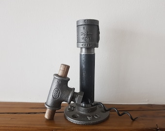 Industrial corkscrew from malleable iron and reclaimed wood