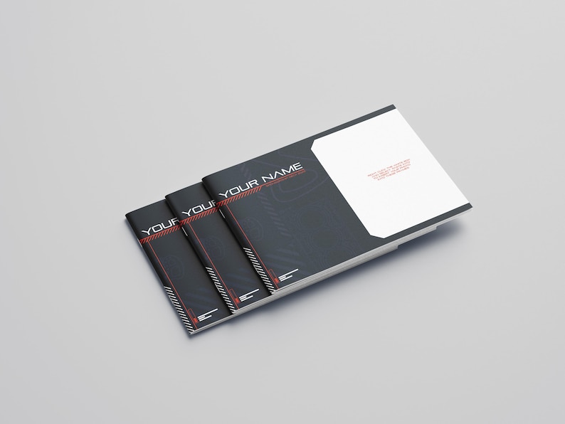 May include: A stack of black brochures with the text "YOUR NAME" in white and red. The brochures have a modern design with a white section on the top right. The background is a light gray.