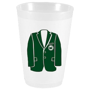 May include: A white plastic cup with a green blazer design. The blazer has a two-button closure, notched lapels, and a small emblem on the chest. The cup is made of a translucent material.