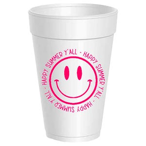 May include: A white foam cup with a pink smiley face and the words "Happy Summer Y'all" printed around the smiley face. The cup is cylindrical with a slightly flared rim.