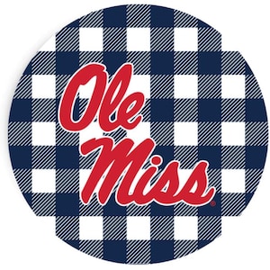 May include: A round, navy blue and white checkered design with the words "Ole Miss" in red script. The design is reminiscent of a classic gingham pattern, perfect for fans of the university.