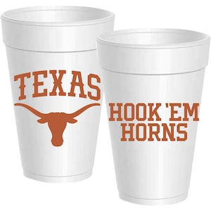 May include: Two white foam cups with orange text and graphics. One cup reads "TEXAS" above a longhorn silhouette. The other cup says "HOOK 'EM HORNS".