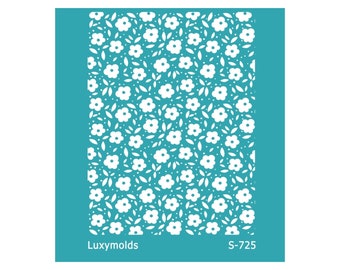 May include: A turquoise blue stencil with a white floral pattern. The stencil has the text "Luxymolds" and "S-725" printed on it.