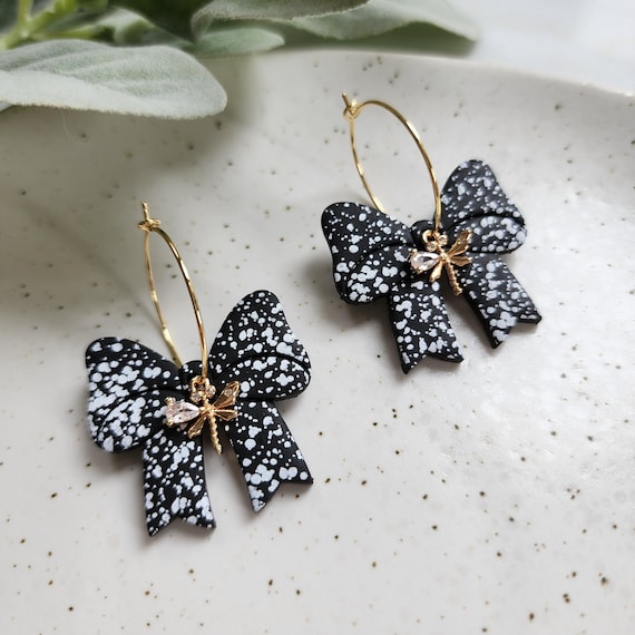Black Matte Polymer Clay Bow Earrings with White Splash Print – Gold Hypoallergenic Hoops  CZ Dragonfly Charms