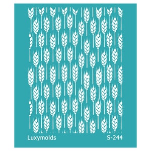 May include: A teal stencil with a repeating pattern of white wheat stalks. The stencil has the text "Luxymolds" and "S-244" printed on it. The wheat design is a classic and versatile pattern.