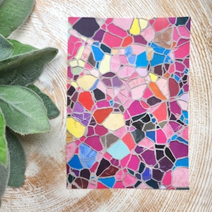 May include: Abstract mosaic pattern with pink, red, blue, yellow, and purple colours. The mosaic is made of small, irregular shapes.