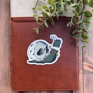 Skull and moon shell on snail sticker, Aztec inspired snake tie sticker,