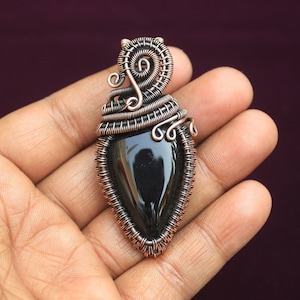 Handgemaakte zwarte onyx koperdraadwikkelhanger