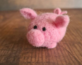 Figurine en feutre porte-bonheur cochon