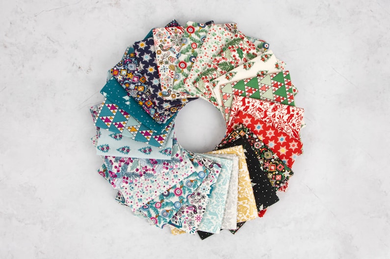 May include: A collection of 20 fabric squares featuring a variety of Christmas-themed patterns, including snowflakes, trees, and reindeer. The squares are arranged in a circle, with the colours red, green, blue, white, and gold.