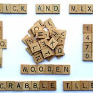 May include: A set of wooden Scrabble tiles with the letters P, I, C, K, A, N, D, M, L, X, A, T, O, Z, W, O, O, D, E, N, S, C, R, A, B, B, L, E, T, I, L, E, S and the numbers 1, 2, 3, 4, 5, 6, 7, 8, 9, 0, and a blank tile.