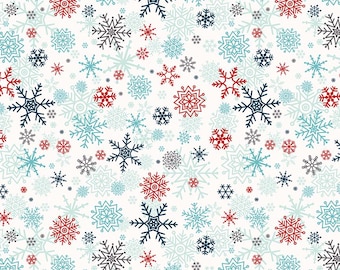 Könnte beinhalten: Ein weißer Stoff mit einem sich wiederholenden Muster aus Schneeflocken in verschiedenen Größen und Designs. Die Schneeflocken sind in Rot, Dunkelblau und Hellblau gehalten. Ein Lineal am unteren Rand zeigt eine Skala von 30 cm.