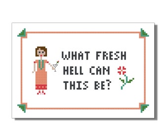 Può includere: Uno schema di punto croce con una donna che tiene un bicchiere di martini con il testo "What fresh hell can this be?"