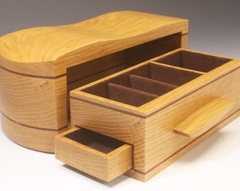 Decorative but functional one drawer band saw box with multiple cubicles and a hidden surprise.