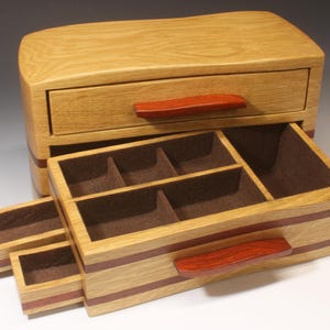 Trendy and fashionable two drawer oak band saw jewelry box with hidden surprises!
