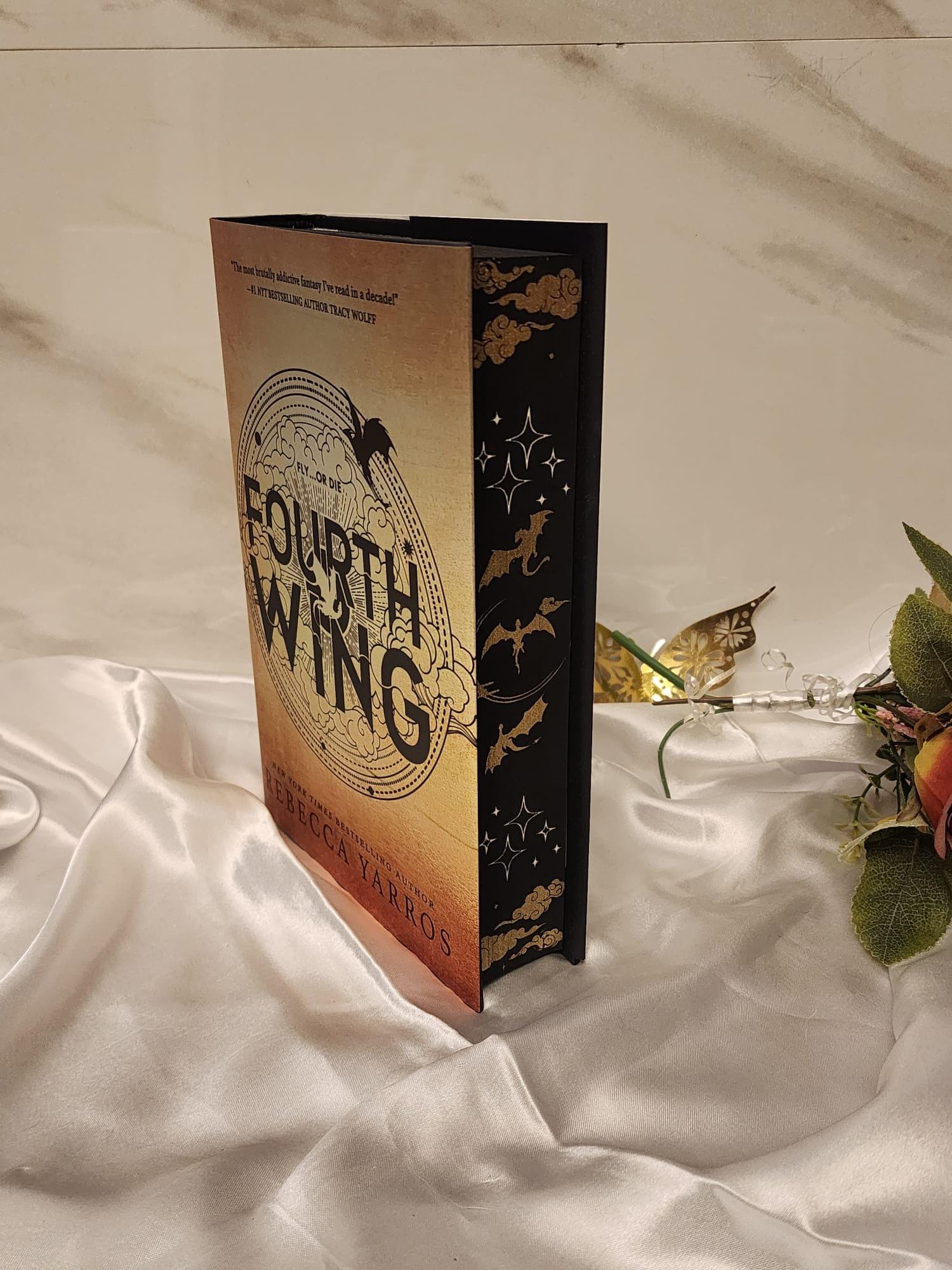 Fourth Wing, Iron Flame and Onyx Storm with stenciled edges
