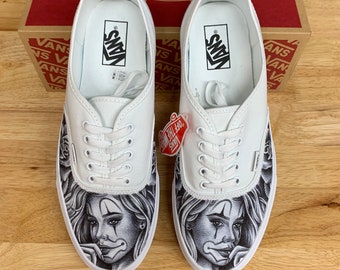 white vans with drawings