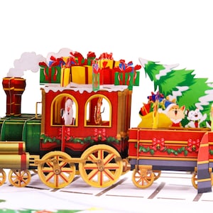 Santa’s Holiday Express, karta pop-up, karty okolicznościowe 3D pop-up – wyjątkowa, poświęcona sztuka ręcznie robiona/wykonana w kształcie serca