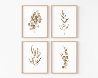 May include: Set of four framed prints featuring botanical illustrations of eucalyptus leaves in shades of brown on a white background.
