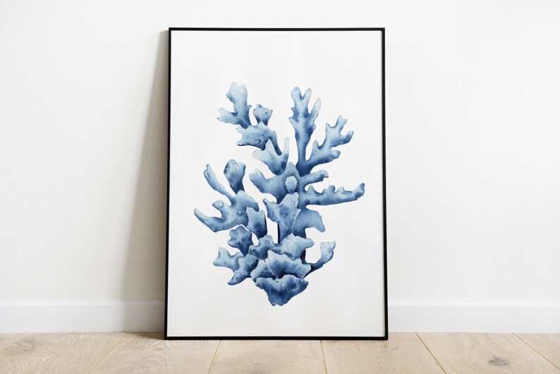 May include: A framed watercolor painting of blue coral on a white background.