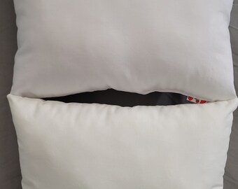 May include: Two white pillowcases, one on top of the other. The pillowcases are made of a soft, smooth fabric.