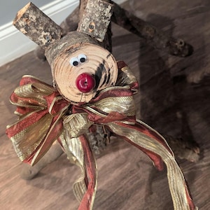 Hand made carved log Reindeer, wood carved