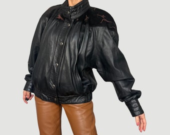 Vintage Woman Black Leather Bomber Jacket With Painted Vintage Woman Black Leather Bomber Jacket With Painted