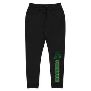 May include: Black sweatpants with a green and yellow graphic of a French Bulldog and the word "Frenchie" on the right leg.