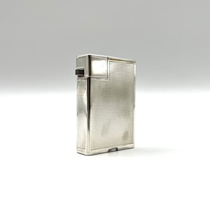 Encendedor de gasolina para coleccionistas vintage chapado en plata con brazo elevador sabroso DUNHILL