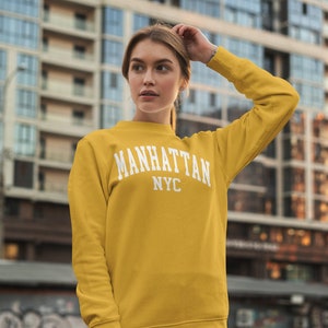 Manhattan NYC Varsity Crewneck Sweatshirt, Unisex Heavy Blend crewneck, New York City Gifts Manhattan Preppy