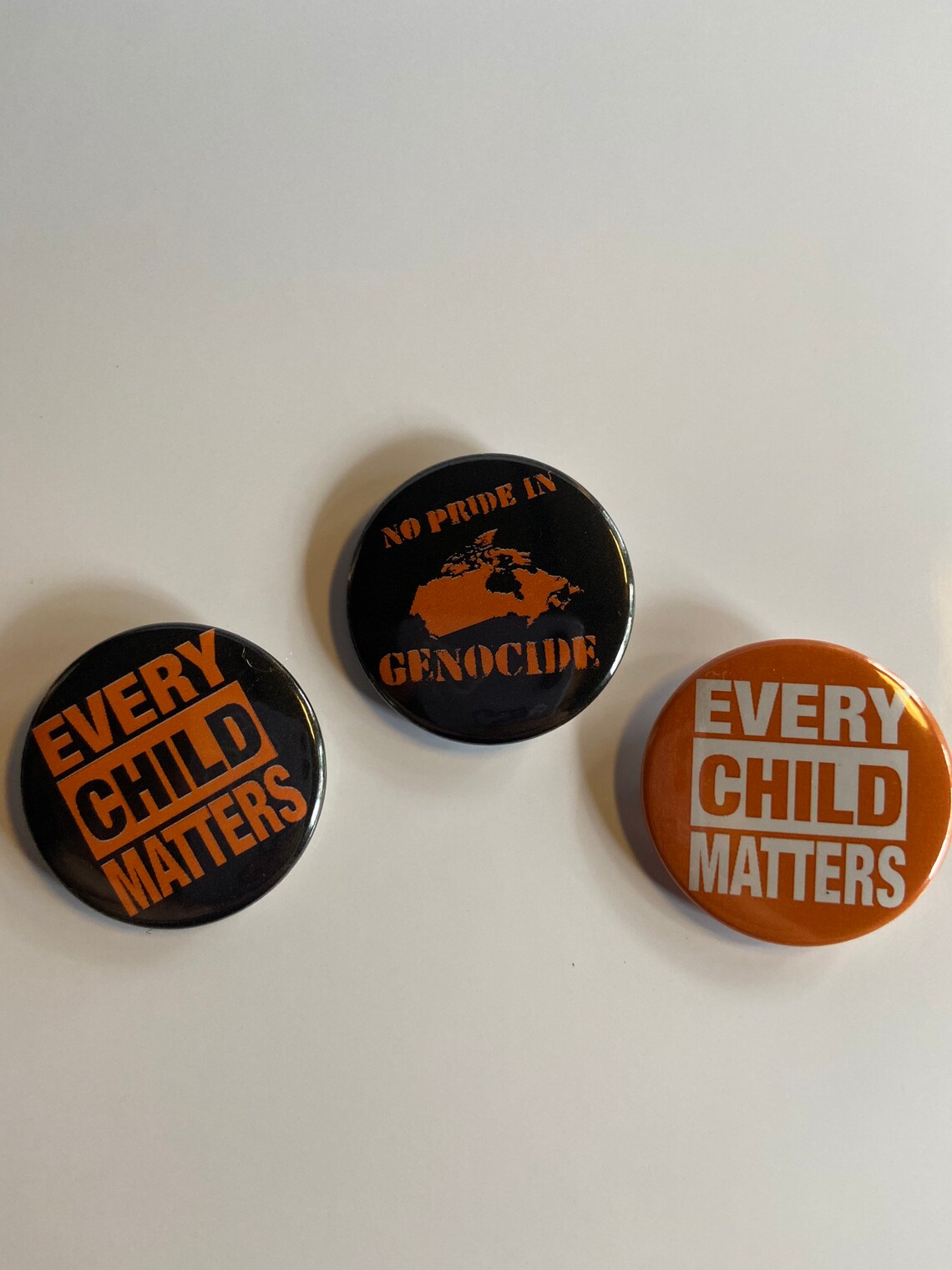 dinocide badge dinocide badge