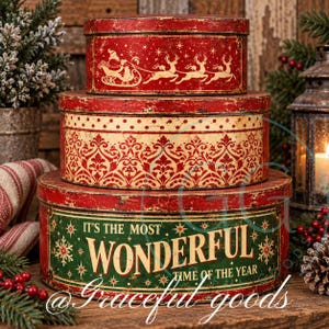 May include: A stack of three round metal tins with a distressed finish. The top tin is red with gold reindeer and Santa. The middle tin is cream with red damask patterns. The bottom tin is green with the text IT'S THE MOST WONDERFUL TIME OF THE YEAR.